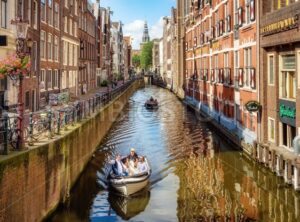 Canal in the Old town of Amsterdam city, Netherlands