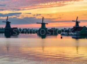 Windmills in Zaanse Schans, Holland, on sunrise