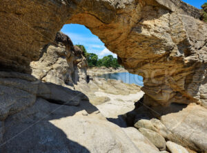 La Roche Percee rock on Lantecost beach, Brittany, France - GlobePhotos - royalty free stock images