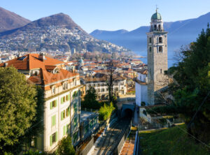 Lugano cityscape with Cathedral, Lake and the mountains, Switzerland - GlobePhotos - royalty free stock images