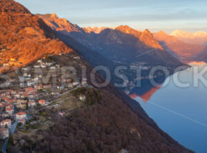 Lake Lugano and Alps mountains on sunset, Switzerland