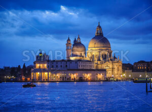 Santa Maria della Salute church in Venice, Italy, in blue light