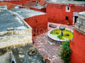 Colorful yard with a fountain in the Santa Catalina monastery, Arequipa, Peru