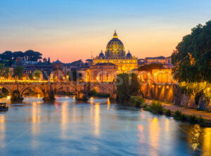 Vatican Basilica and Tiber river in sunset light, Rome, Italy