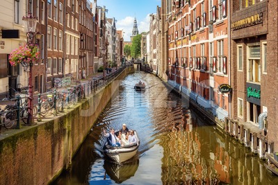 Canal in the Old town of Amsterdam city, Netherlands Stock Photo