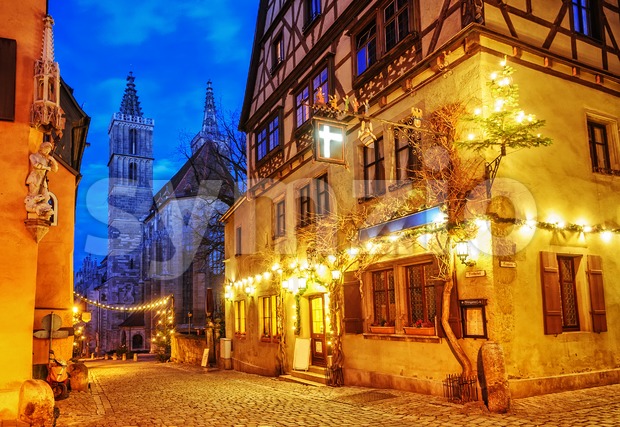 Christmas decoration lights at night in Rothenburg ob der Tauber, Germany Stock Photo