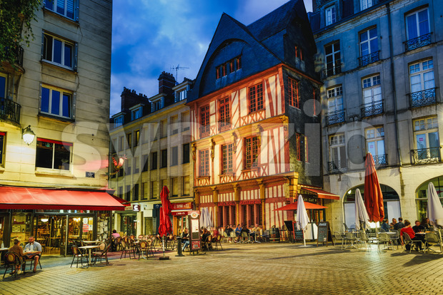 Street cafes in Nantes city at night, France Stock Photo