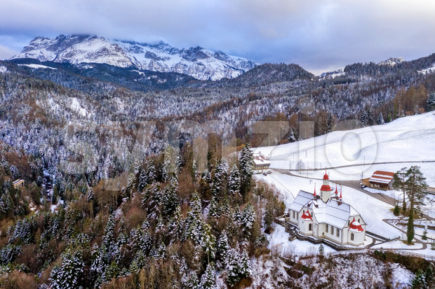 Hergiswald church in Alps mountains, Switzerland, in winter Stock Photo