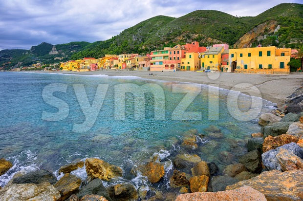Colorful fisherman's houses on the sand beach lagoon Varigotti, Liguria, Italy Stock Photo
