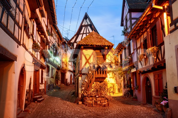 Traditional half timbered houses in Eguisheim by Colmar, Alsace, France Stock Photo