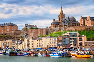 Gothic church on the hill and fishermen boats in port town Granville, Normandy, France Stock Photo