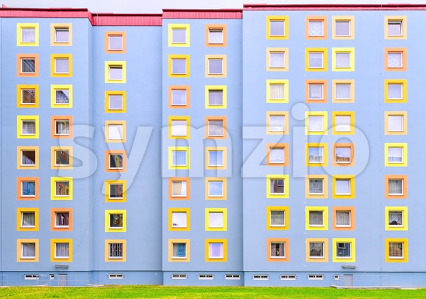 Facade of the modern colorful multistory house Stock Photo