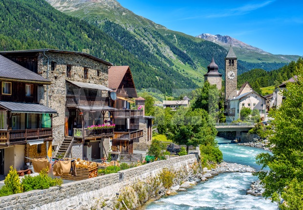 Swiss village in Alps mountains, Grisons, Switzerland Stock Photo