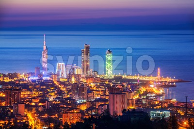 Panorama of Batumi city, Georgia, illuminated on sunset Stock Photo