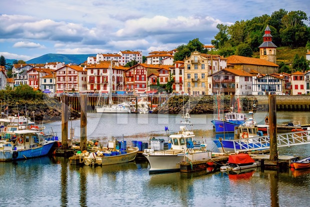 Colorful basque houses in port of Saint-Jean-de-Luz, France Stock Photo