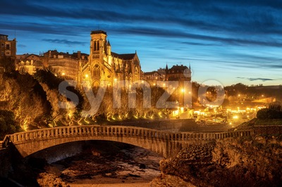Biarritz, St Eugenia Church and Old Port at night, Basque country, France Stock Photo