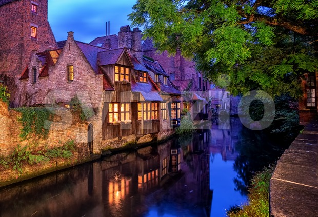 Bruges Old Town, Belgium. Traditional medieval houses at night. Stock Photo