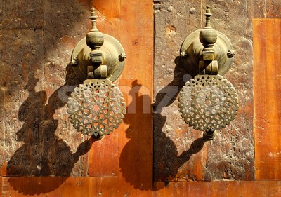 Moroccan decorated bronze door knobs, Morocco Stock Photo